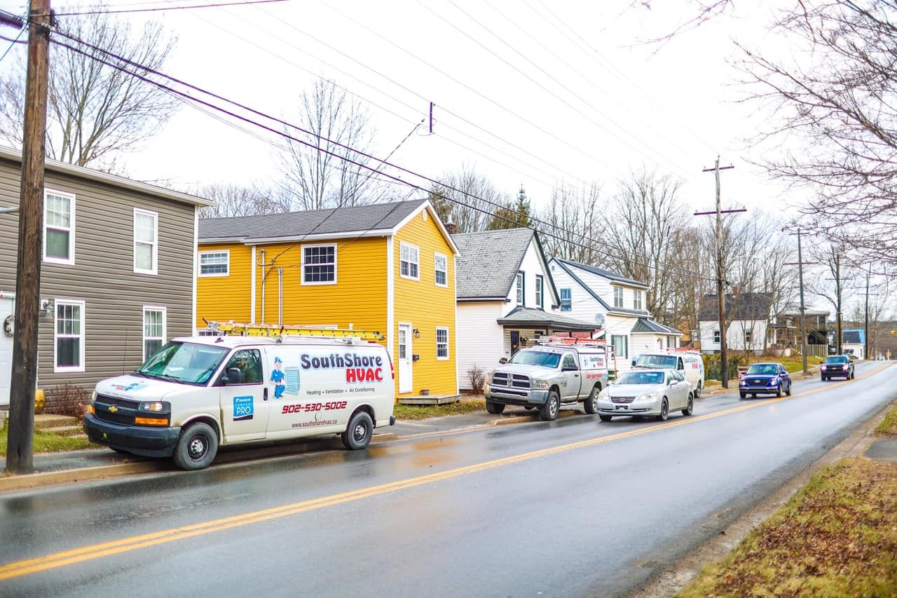 Service vans on a South Shore street